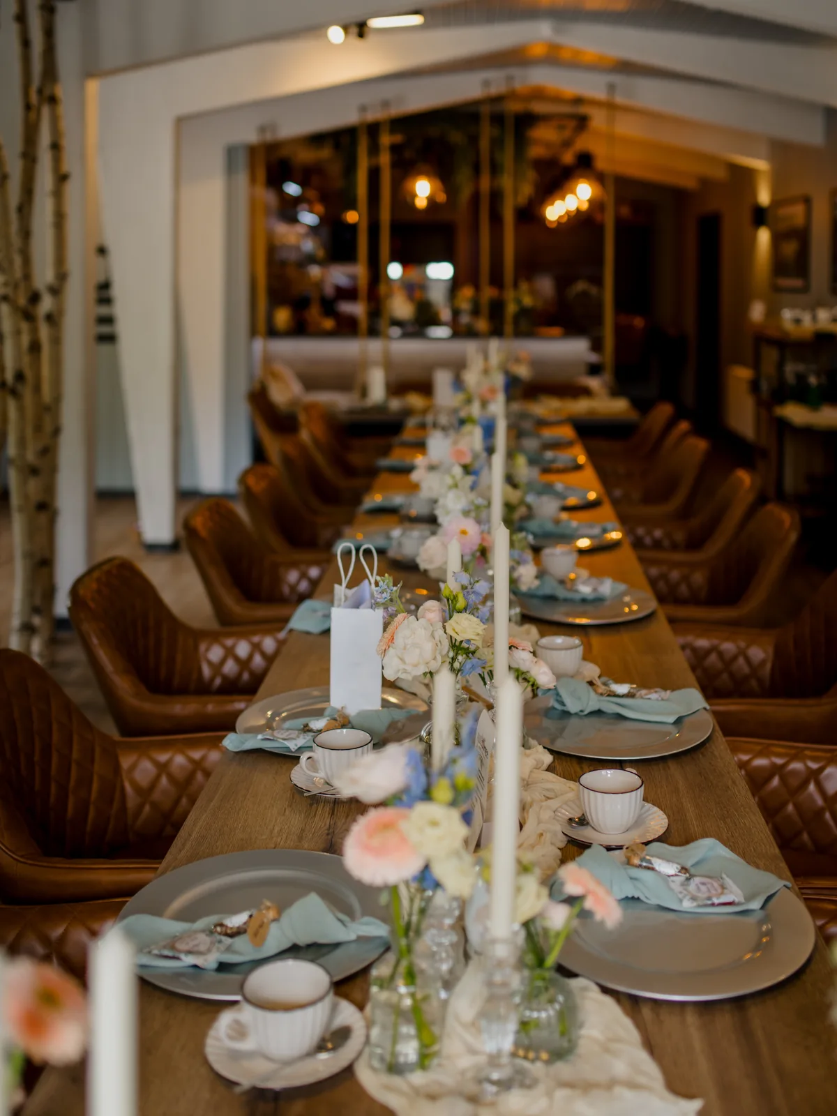 Long set wedding table in the interior of the Schmiedehafen
